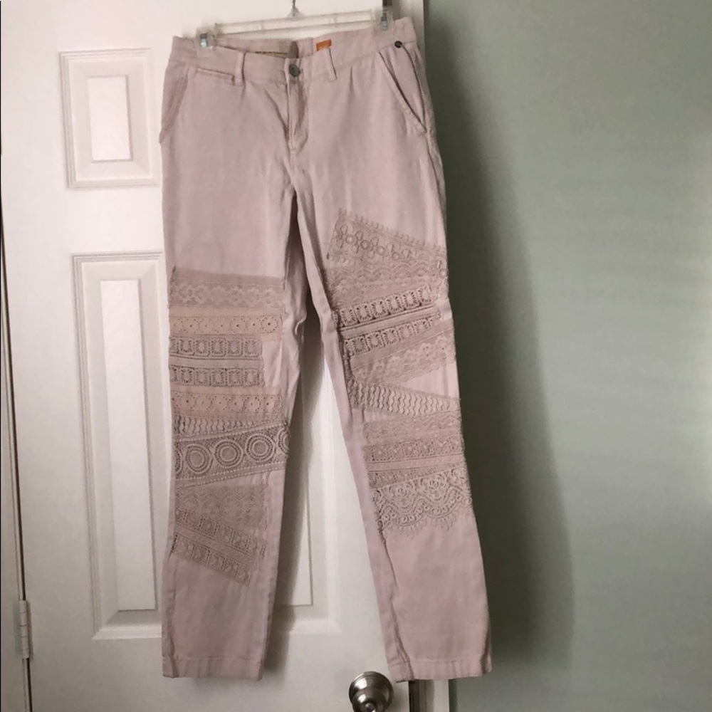 Pink to straight leg cream trousers
